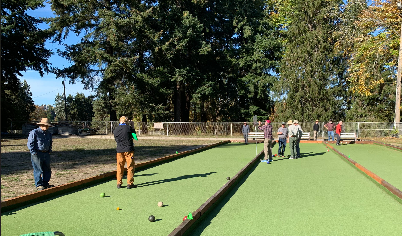older men playing bocce