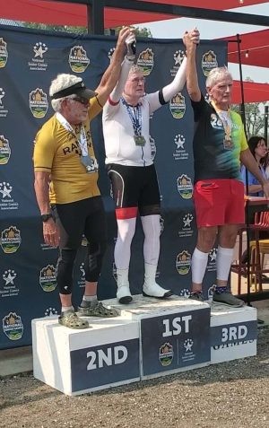 man on senior games podium