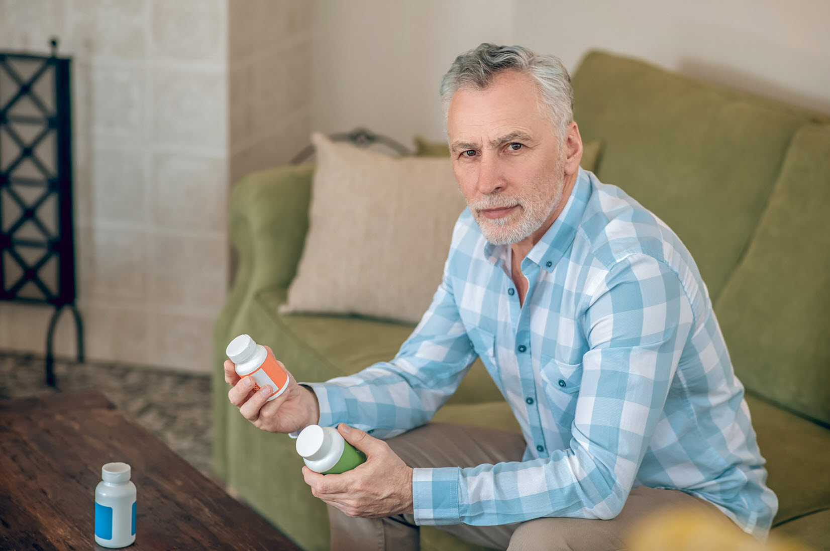 man choosing supplement man choosing supplement