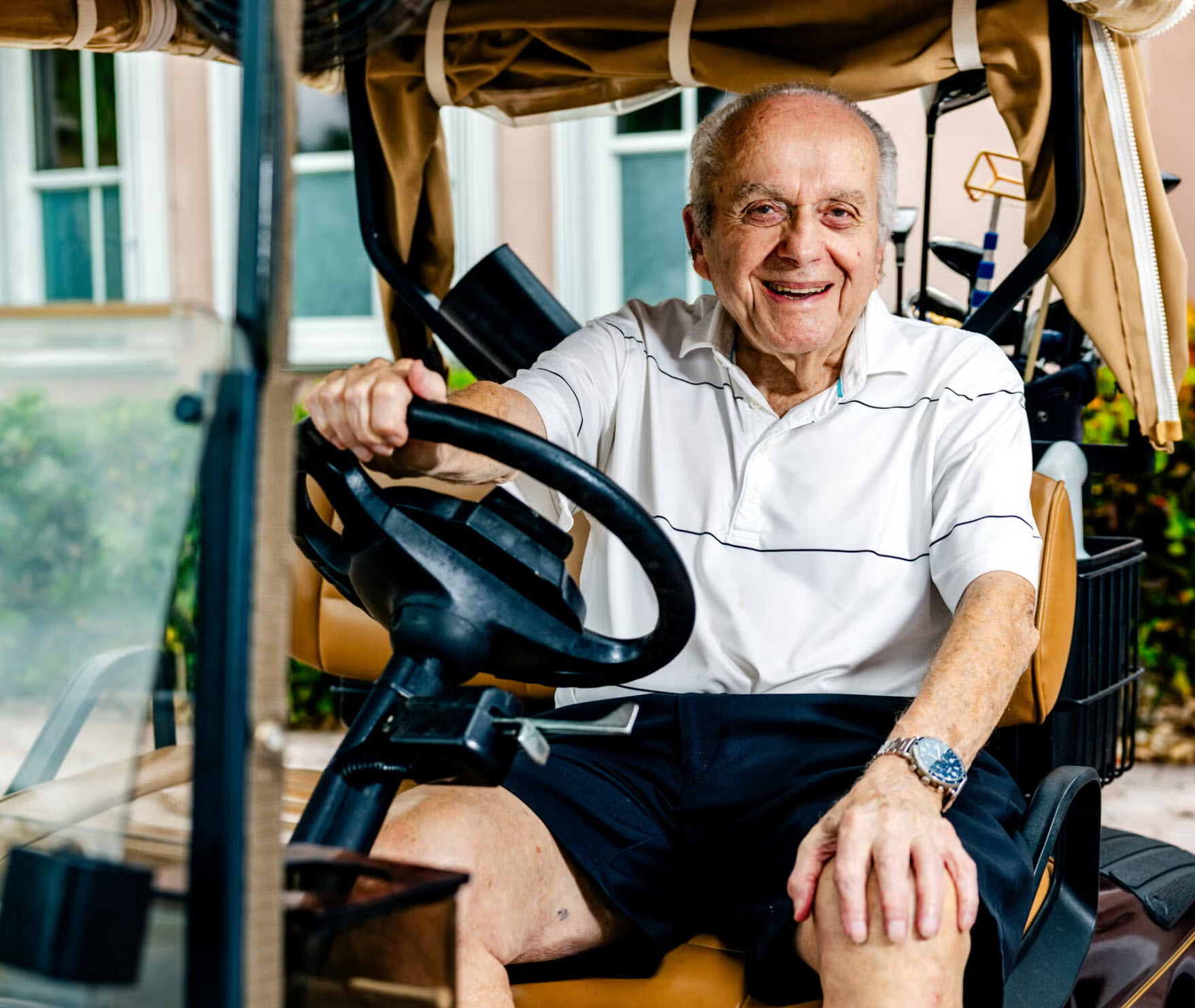man in golf cart