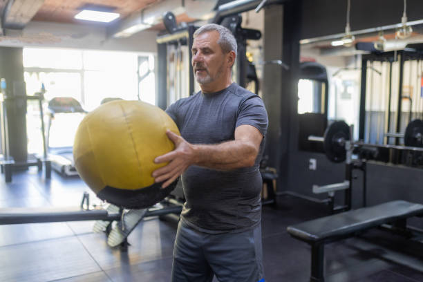 man with medicine ball