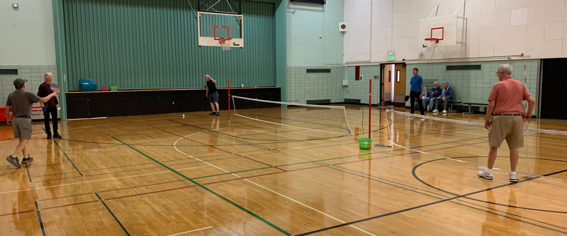 men playing pickleball